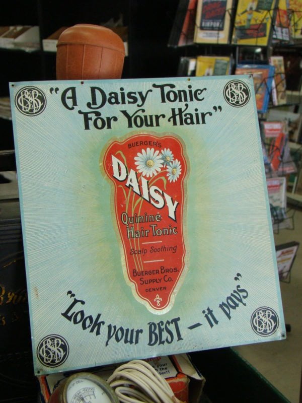 Daisy Quinine Hair Tonic Tin Advertising Sign