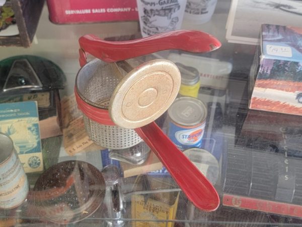 Red Hand Held Potato Ricer Open